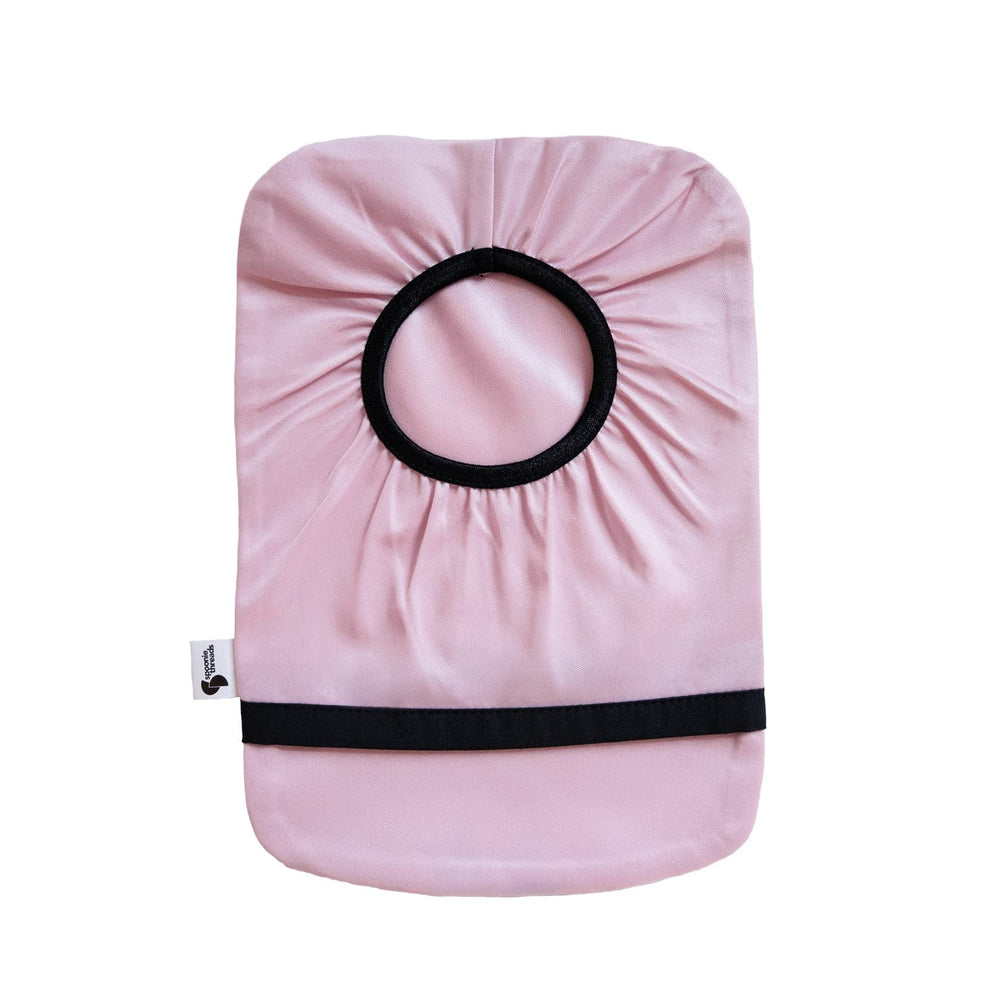 Spoonie Threads light pink ostomy bag cover close up showing adjustable fit