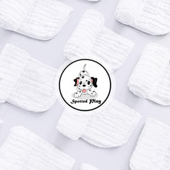 Close-up of Spotted Play muslin fabric, breathable and gentle on baby's skin.