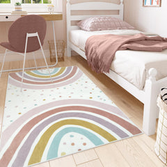 STARUIA Rainbow Rug features polka dots to spark playful decor and tactile exploration.