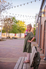 Stephen Joseph Sip and Snack Rainbow flip-top lid keeps straw clean and leak-free.