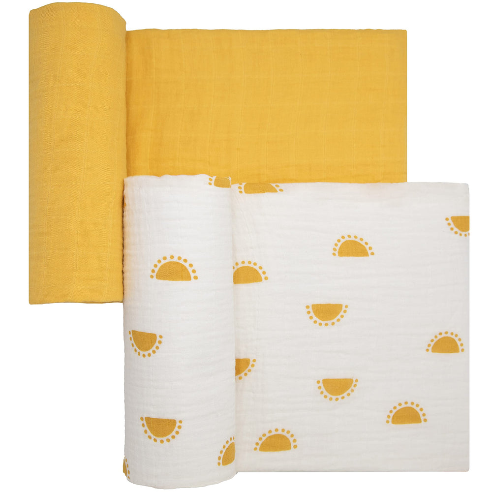 Sticky Toffee Muslin Swaddle Blanket, yellow suns close-up, breathable cotton texture.