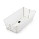 Stokke Flexi Bath X-Large in Sandy Beige folded for compact storage.