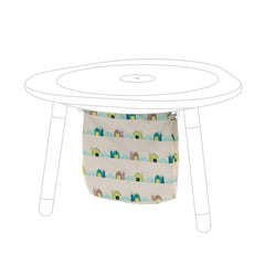 Stokke MuTable cotton bag with windmills keeps toys organized and play area tidy.