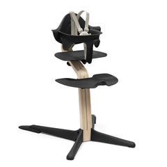 Stokke Nomi high chair at table for family meals.