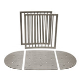 Stokke Sleepi Bed Extension V3 hazy grey shows simple assembly for nursery flexibility.