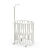 Stokke Sleepi Mini Bundle White bed view emphasizes a breathable sleep setup for infants.