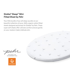 Stokke Sleepi Mini fitted sheet Rainbow Dot pattern adds playful touch to crib.