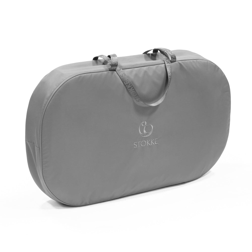 Stokke Snoozi Bag in dark grey protects the Snoozi bassinet during travel.