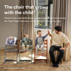 Stokke Tripp Trapp baby set 2 Nordic Grey attachment in action for ages 6-36 months
