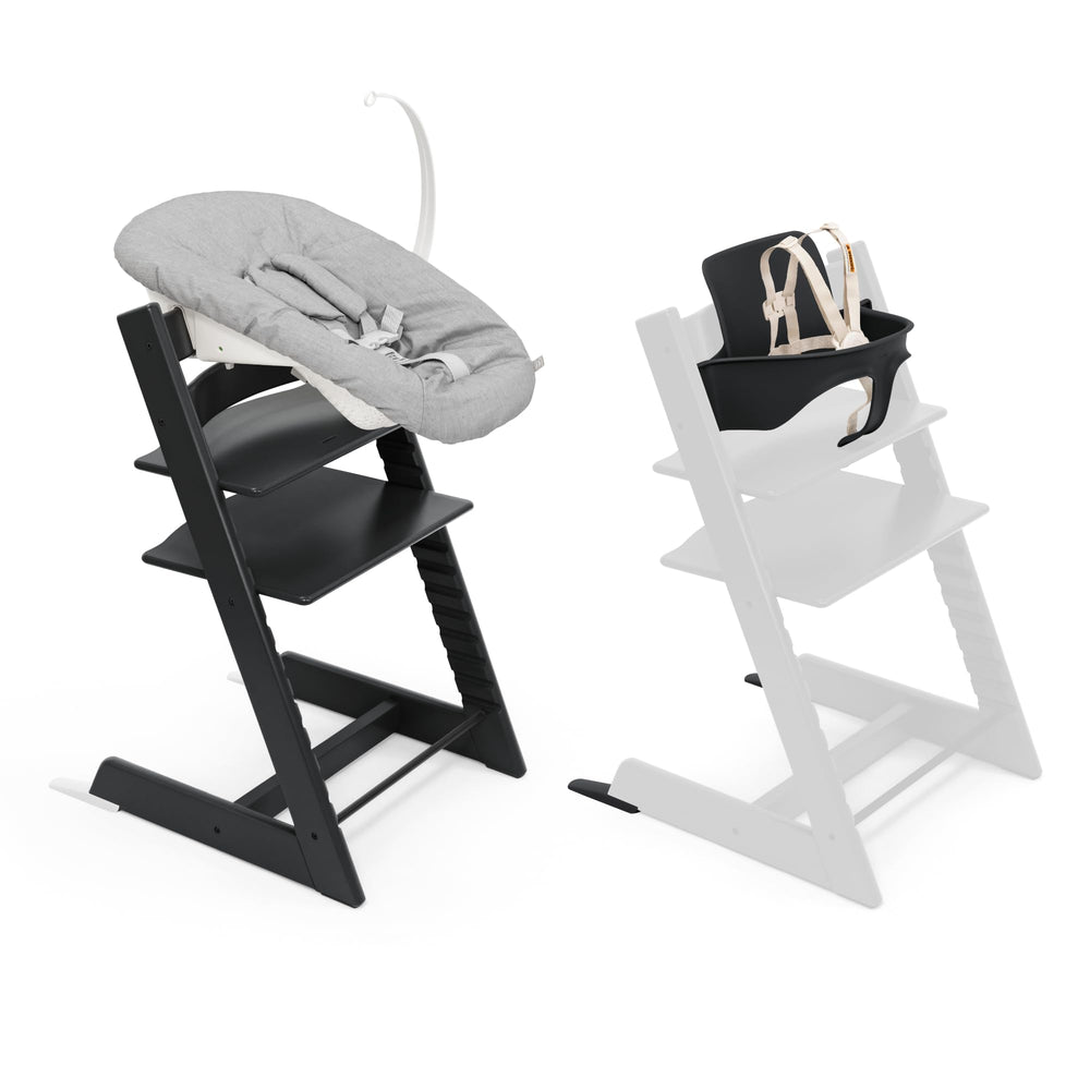Stokke Tripp Trapp chair black with newborn set, ergonomic seating.