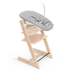 Stokke Tripp Trapp chair natural finish with adjustable seat for growing kids.