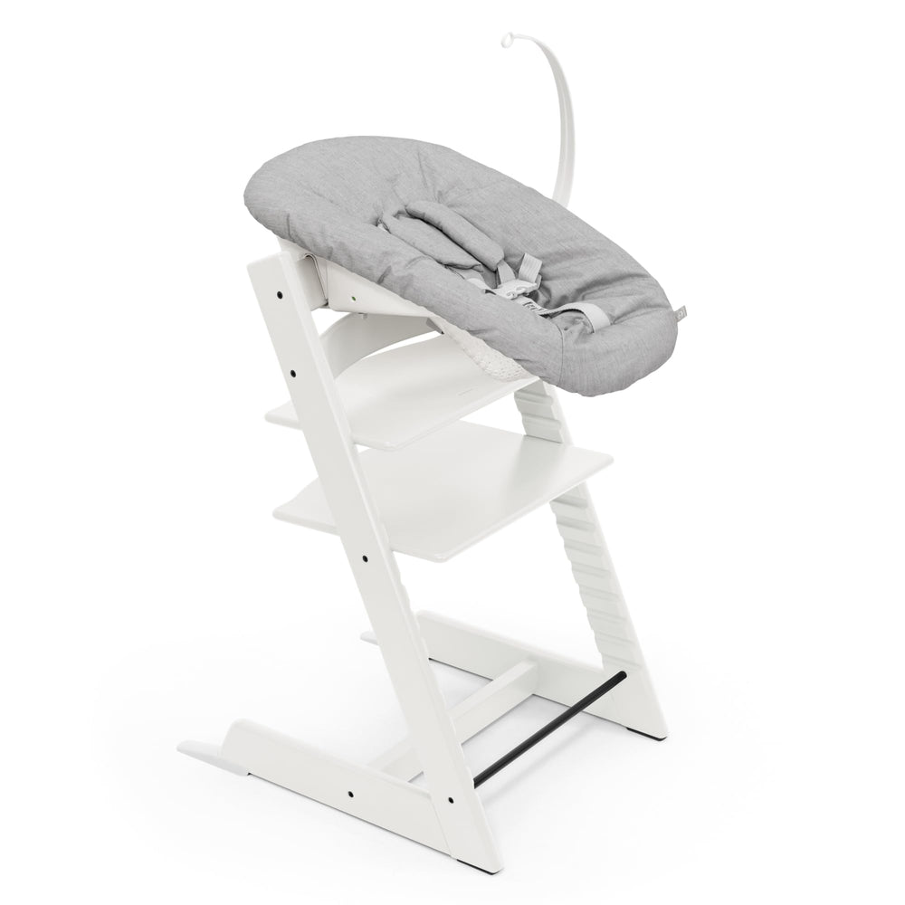 Stokke Tripp Trapp chair white, front view, compact at-table seating for families.