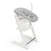 Stokke Tripp Trapp chair white, front view, compact at-table seating for families.