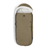 Stokke YOYO Footmuff Toffee with sherpa lining keeps baby warm during chilly stroller rides.