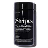Stripes Beauty Naomi Watts Addition bottle on desk for daily probiotic support and wellness.
