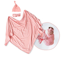 Stroller Society newborn swaddle blanket in pink, soft and breathable for cozy wrapping