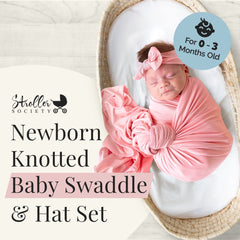 Stroller Society top-knot hat on newborn, adjustable for a snug 0 3 month fit