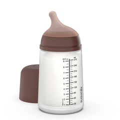 Suavinex Zero Zero anti-colic bottle close-up showing air-reducing bag for calmer feeds.