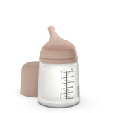 Suavinex Zero Zero bottle with anti-colic pocket showing reduced air intake during feeding.