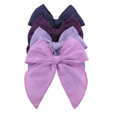 Sugarmelon Fable Bow lilac close-up on soft linen fabric, perfect for everyday wear.