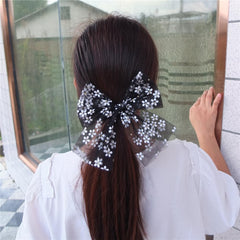 Sugarmelon lace-detail bow hair clip in white, adds elegant touch.