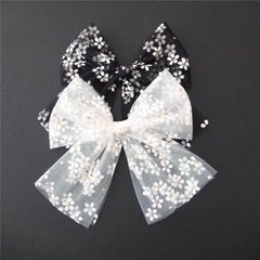 Sugarmelon large tulle bow hair clip for baby girls in black, ideal for party outfits.