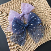Sugarmelon large tulle bow hair clip front view for baby girls with bold, wearable style
