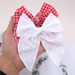 Sugarmelon linen-cotton-velvet bow close-up highlights durable, gentle materials.