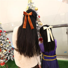 Sugarmelon long-tail velvet bow in brown brings warm winter charm.