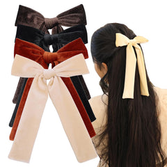 Sugarmelon long-tail velvet bow in cream adds elegant flair.