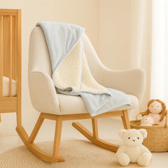 SUNSHINE & SNUGGLES Dove Gray blanket folded on crib for versatile nursery style
