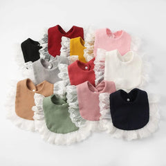 Surakey bib demonstrates water absorption to catch drool during teething and meals