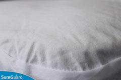 SureGuard top-side barrier blocks dust and allergens for a cleaner crib
