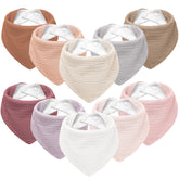 Susurration bib flatlay highlighting soft muslin front and plush backing for absorbent protection