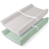 Susurration changing pad cover with soft minky dots in grey-green for gentle diaper changes.