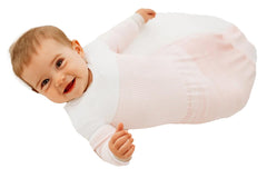 Swaddelini arms-out sleep sack pink provides gentle support for calm, restful sleep