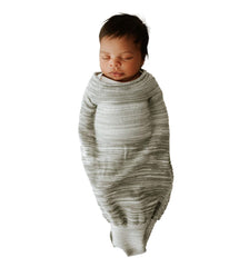 Swaddelini large swaddle sleep sack with seamless 3D knit for secure, cozy sleep.
