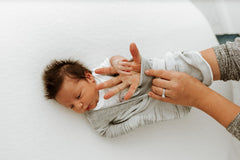 Swaddelini moisture-wicking fabric helps keep baby dry through the night.