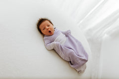 Swaddelini Swaddle Sleep Sack lavender close-up highlights soft, durable nylon