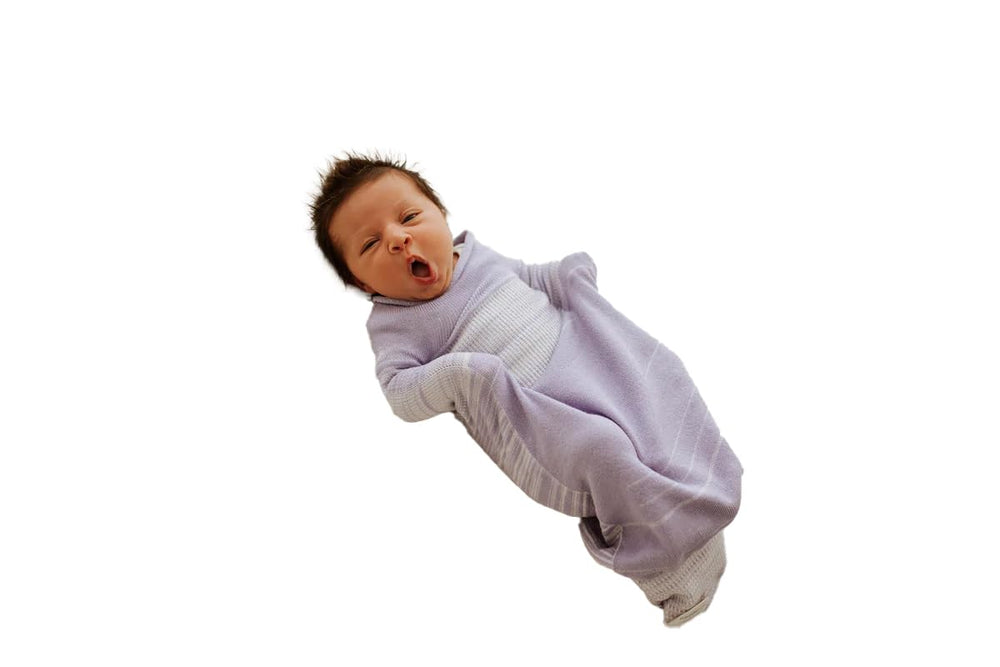 Swaddelini Swaddle Sleep Sack lavender demonstrates breathable fabric for cozy nights