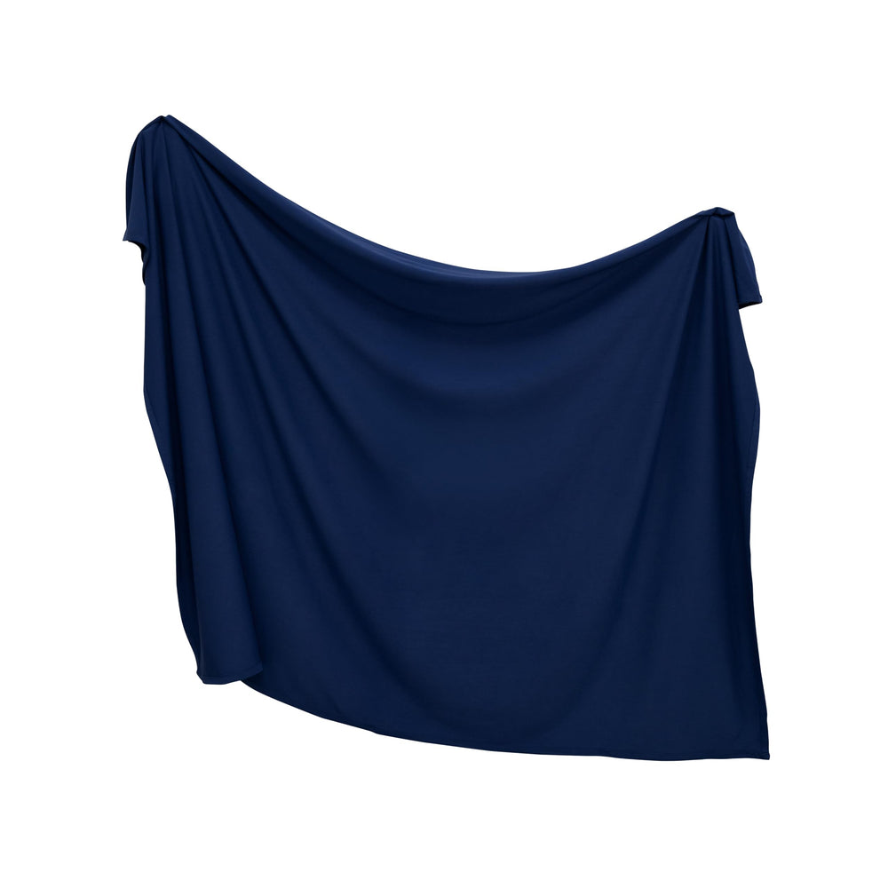 SWaddle AN blanket in blue depths, close-up of soft fabric for gentle newborn comfort