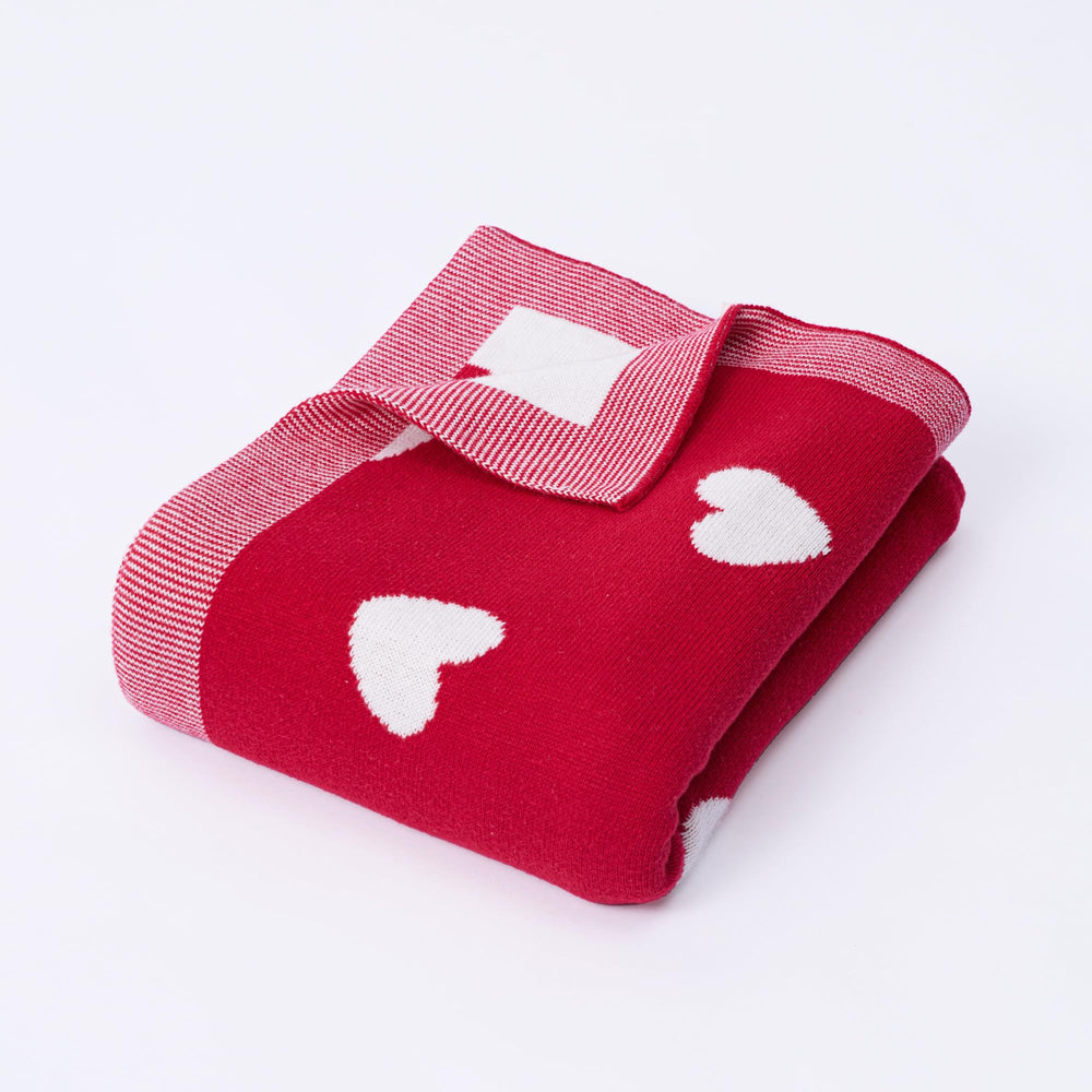 SWaddle AN Valentine two-sided heart blanket shows reversible design for cozy baby snuggles.