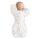 SwaddleDesigns arm-up sleeves with mitten cuffs promote gentle self-soothing and safer sleep.