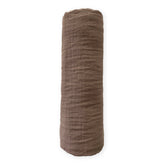 SwaddleDesigns cotton muslin swaddle blanket offers soft, breathable comfort.