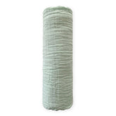 SwaddleDesigns Jadeite swaddle blanket close-up, breathable cotton muslin for baby comfort.