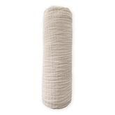 SwaddleDesigns oatmeal cotton muslin swaddle blanket; soft and breathable for cozy swaddling.