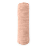 SwaddleDesigns peach blush muslin swaddle blanket, soft and breathable.