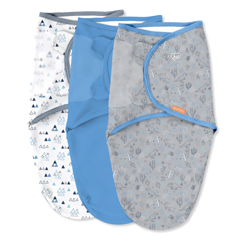 SwaddleMe Dino Time original swaddle; snug fit helps calm baby for sleep.