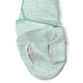 SwaddleMe Luxe Perfect Temp Swaddle in basket weave front view showing breathable organic cotton