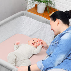 Breathable microfiber sheet by Sweet Jojo Designs feels gentle on baby skin.
